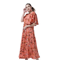  Right angle studio view of CELESTINA orange floral full-length gown
