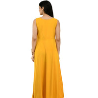 Back studio shot of vibrant yellow full-length gown