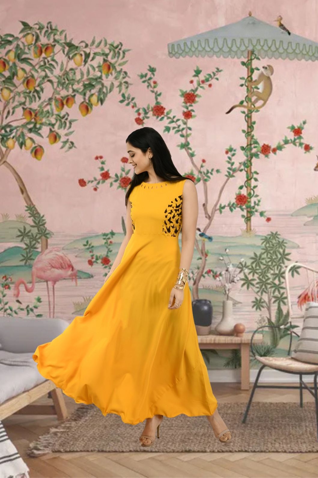  Front view of yellow sleeveless crepe gown in palace backdrop