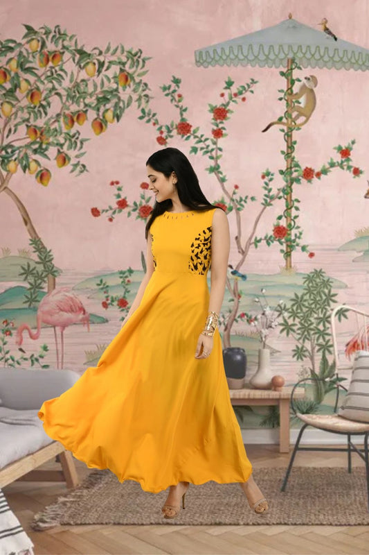  Front view of yellow sleeveless crepe gown in palace backdrop