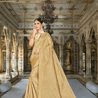 Model in golden Banarasi silk saree with zari motifs in palace room