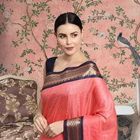 Front view of pink checkered saree in elegant indoor setting