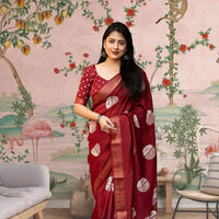 Front view of red cotton crape saree glowing in heritage palace light