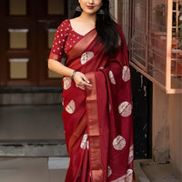 Studio front view of red saree showing structure and blouse pairing
