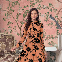 Front view of Thaaravesha dress in orange floral print with full sleeves