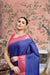 Front view of royal blue checkered saree in elegant palace setting