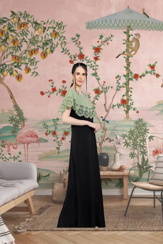 Left profile of green and black full-length crepe gown