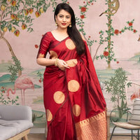 Front view of red silk saree blazing in royal setting