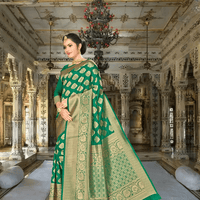 Model in green Banarasi silk saree with gold motifs in royal palace room