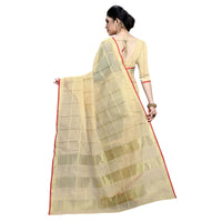 Flowy pallu in beige with glowing checks and vibrant red contrast along the edges