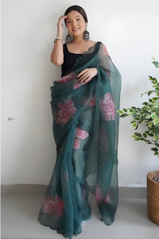  Front view of green organza printed saree in royal palace setting by CELESTINA
