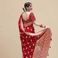 Rear studio view showing unstitched blouse area and drape