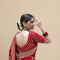 Rear studio view showing unstitched blouse area and drape