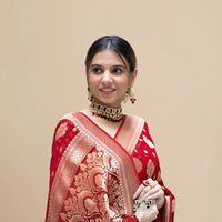  Studio close-up of red pallu and cotton texture blend