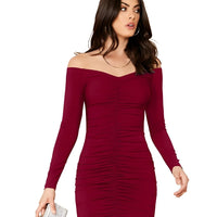 Studio front of Celestina’s “Veins of Venus” maroon V neck knit bodycon dress.