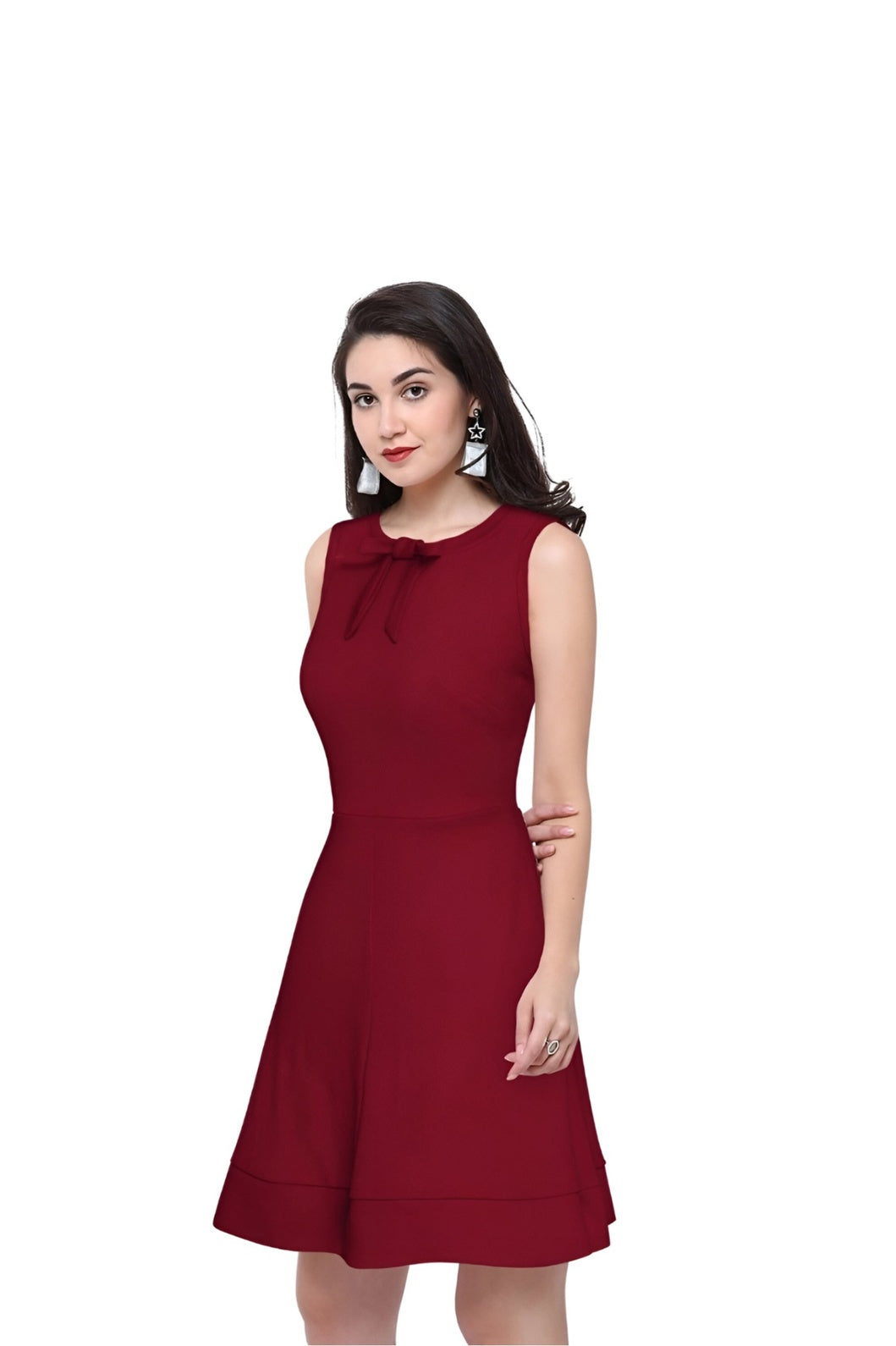 Model showcasing the maroon Velvet Reign dress from Celestina on plain background