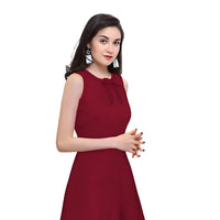 Side profile of Velvet Reign maroon sleeveless dress with clean backdrop
