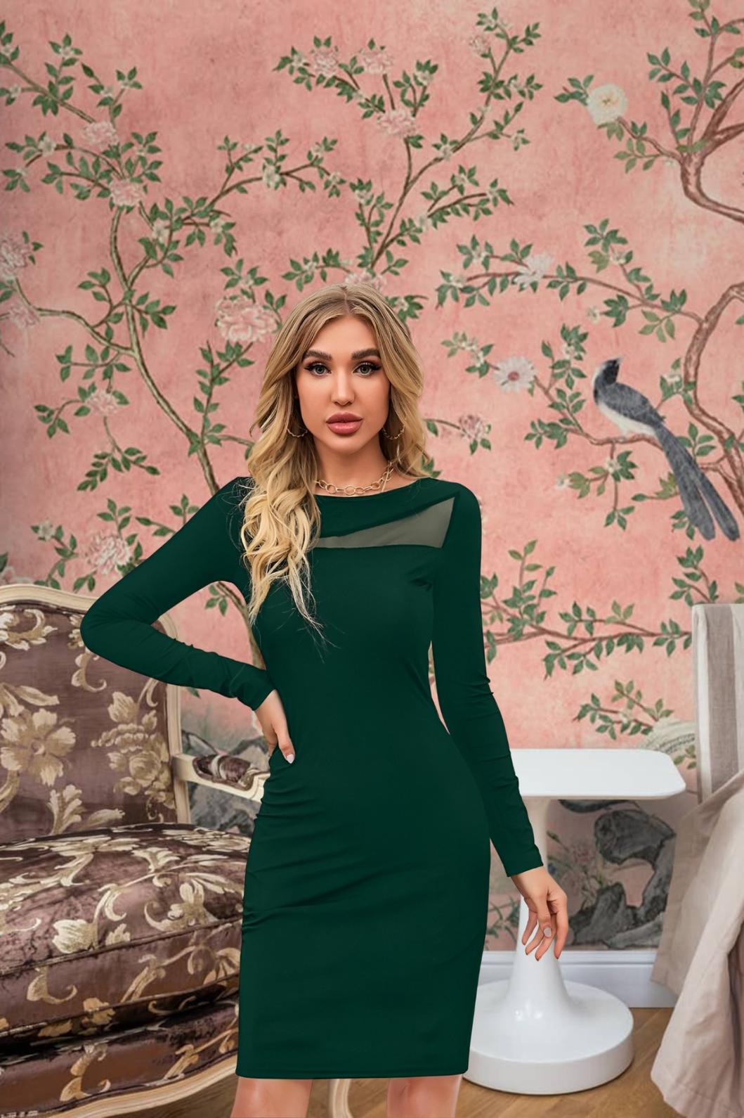 Model in Verdant Verse dark green knit dress – front view with elegant poise