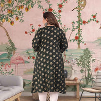Rear shot revealing soft A-line sway among green hues