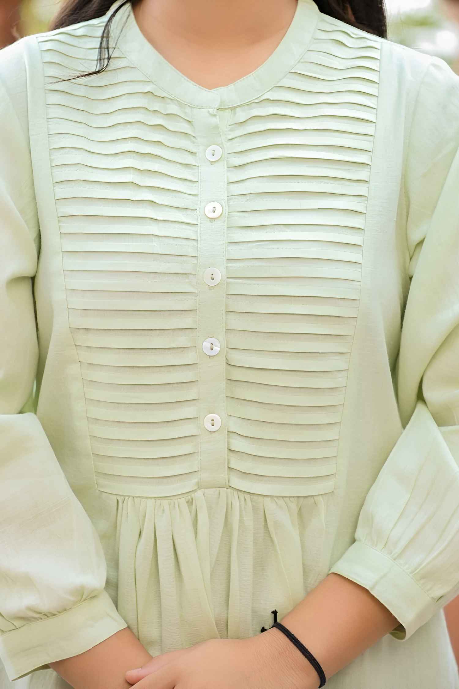  Garment pooled like spilled chemical poetry