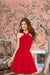 Front view of the Vermilion Vow red halter neck dress with elegant fit