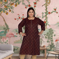  Front view: Maroon kurti glinting with golden artistry