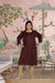  Front view: Maroon kurti glinting with golden artistry