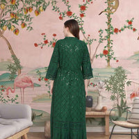 Rear angle revealing embroidery like leafy vines