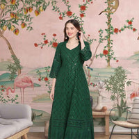  Front view: Dark green kurti against ancient trees