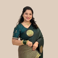 Studio front shot of green printed saree with blouse