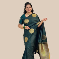 Studio front shot of green printed saree with blouse