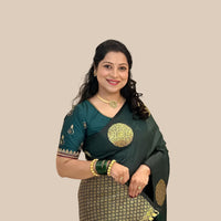 Studio front shot of green printed saree with blouse