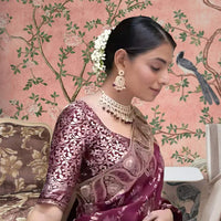Close-up of embellished blouse glowing in palace lights