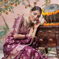 Left profile with radiant purple drape and gold work visible