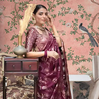 Left profile with radiant purple drape and gold work visible