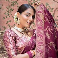 Close-up of embellished pallu glowing in palace lights