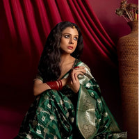 Model showcasing Zarqa Veil saree in an opulent palace setup
